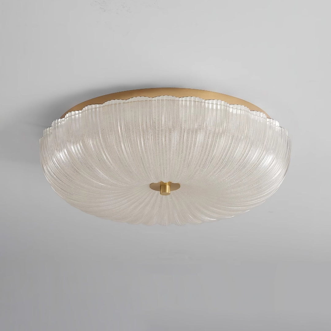 Decorative round LED flush mount ceiling light, rippled glass shade, enhances modern home decor.