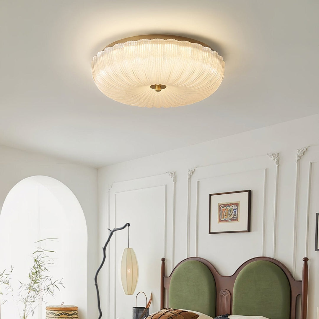 Contemporary round LED flush mount ceiling light, energy-efficient & provides even interior lighting.