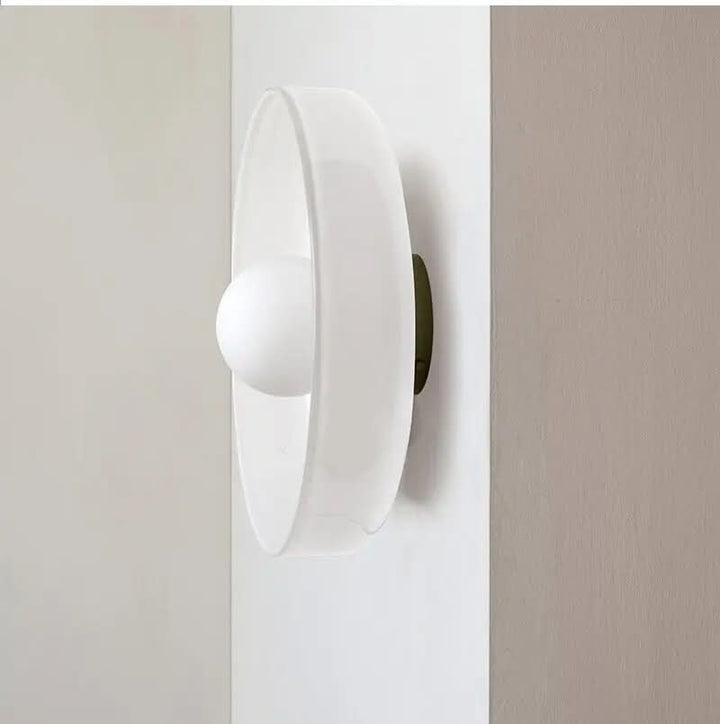 Modern Scandinavian glass ceiling lamp, an elegant home decor lighting piece for atmospheric indoor illumination.