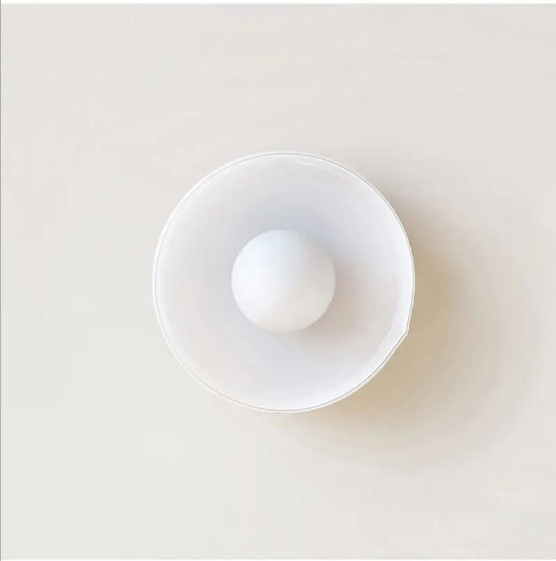 Elegant glass ceiling lamp with sleek Scandinavian design, perfect modern indoor lighting for any stylish room.