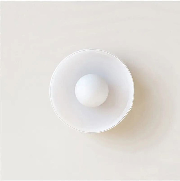 Elegant glass ceiling lamp with sleek Scandinavian design, perfect modern indoor lighting for any stylish room.