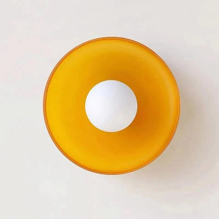 Assorted modern Scandinavian glass ceiling lamps in green, yellow, white for elegant home lighting.