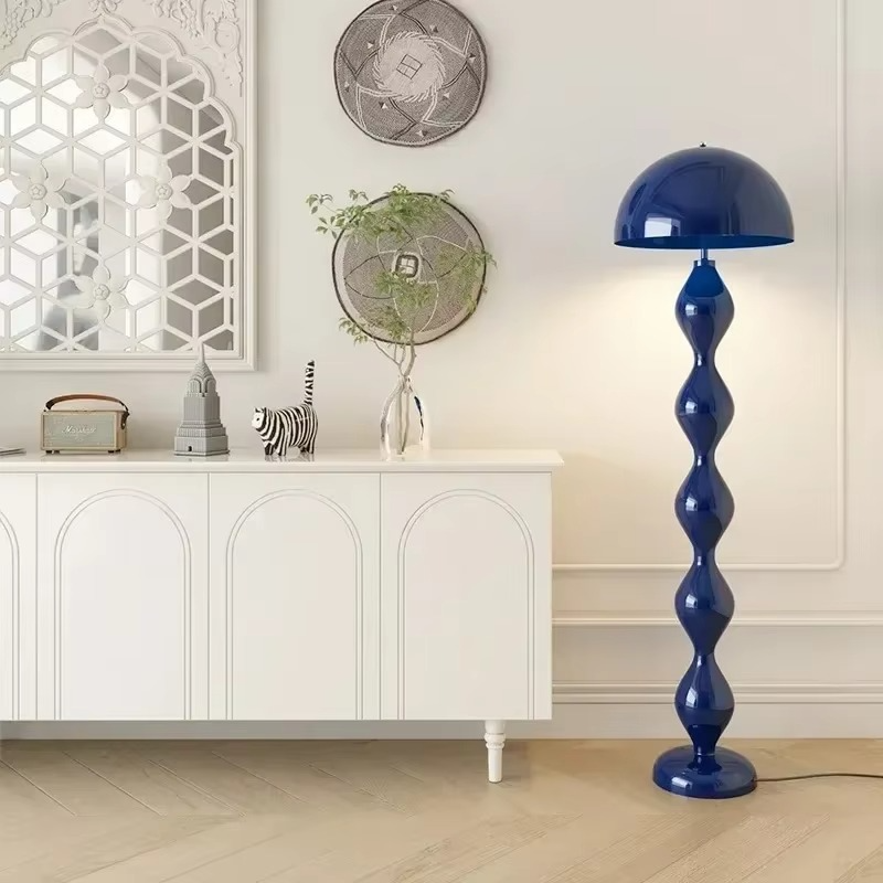 Stylish contemporary floor lamp with a dimmable LED, ideal for ambient bedroom lighting.