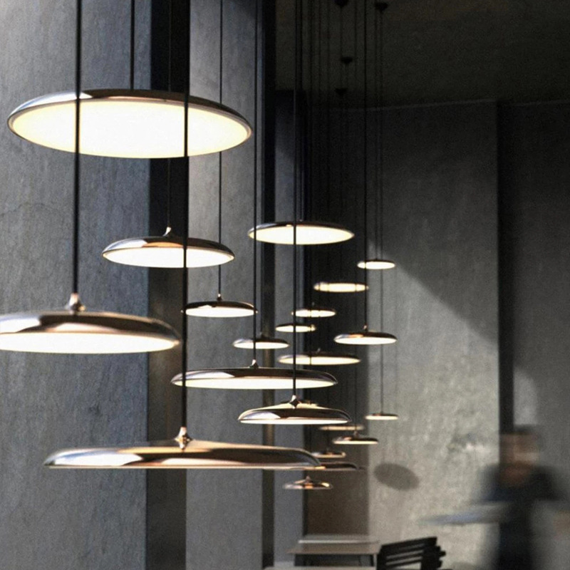 Acrylic LED pendant light, modern Scandinavian, perfect for home office.