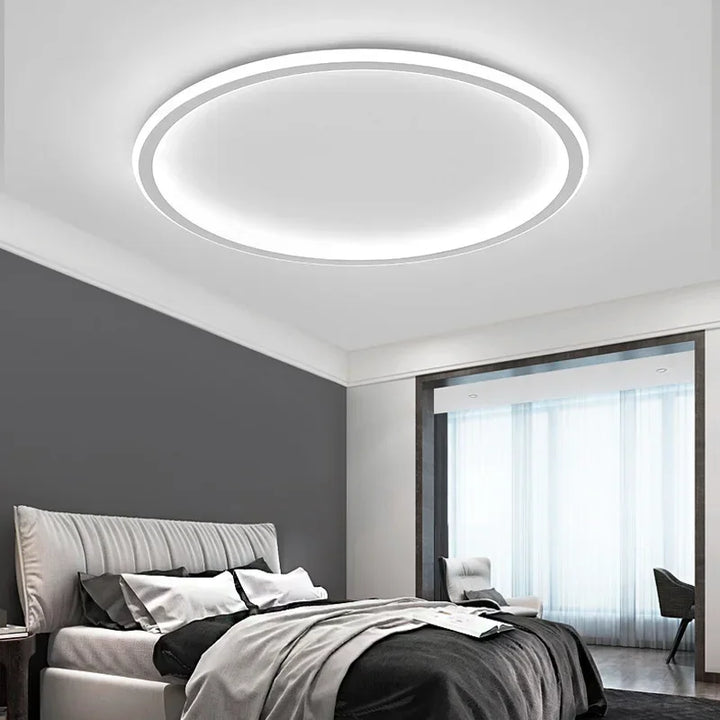 Energy-efficient modern LED ceiling light, Scandinavian round design brightens any home.