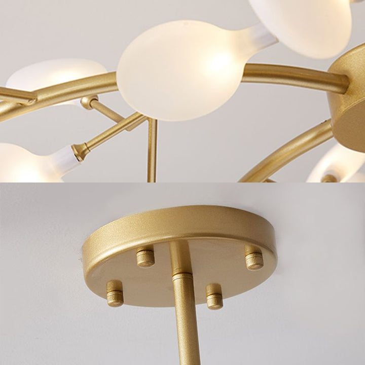 Contemporary sculptural chandelier, black, with intricate branch design.