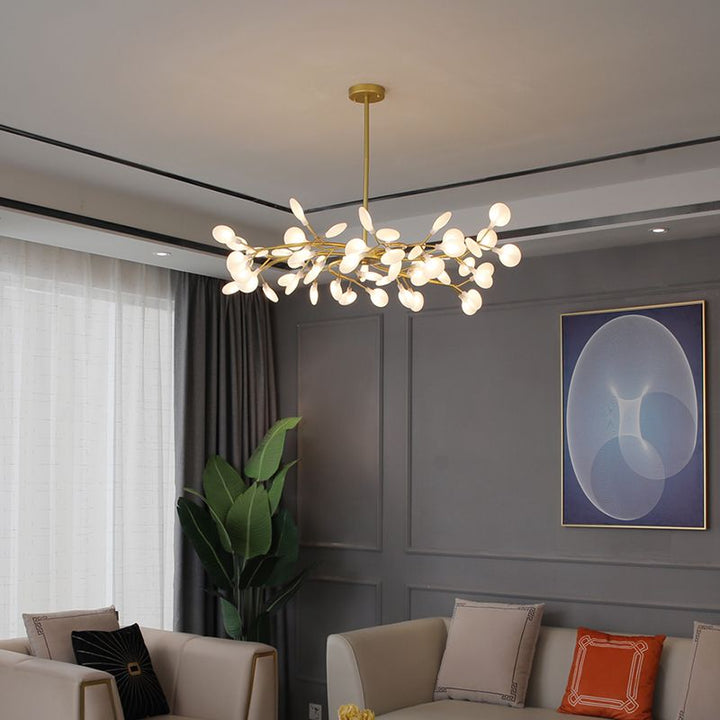 LED sculptural ceiling light, gold finish, inspired by tree branches.
