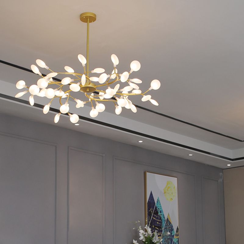Artistic gold branch chandelier, a unique sculptural lighting fixture.