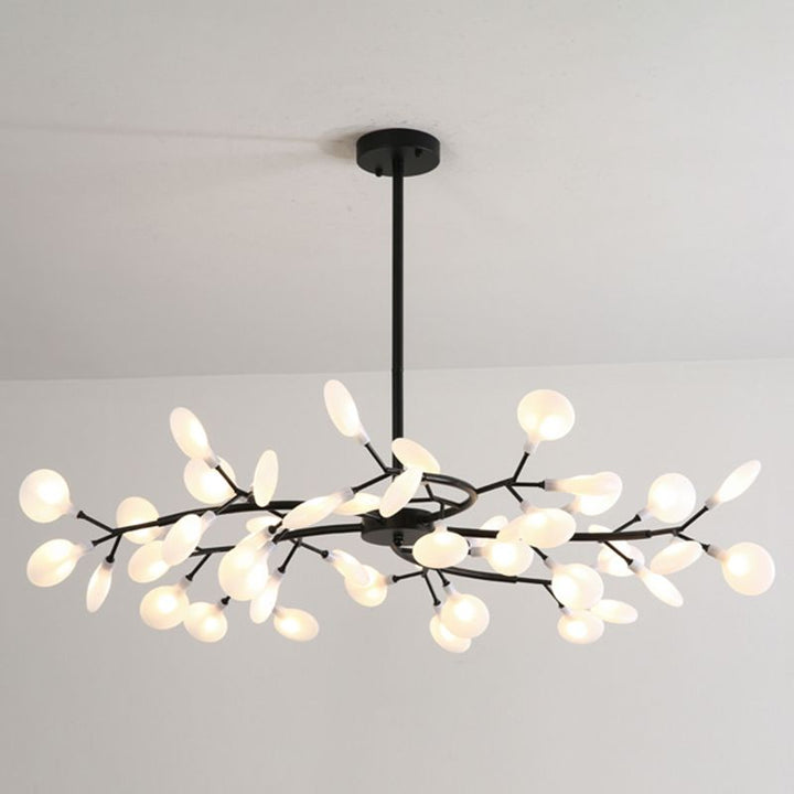 Sleek black modern branch chandelier, ideal for dining room or living area.