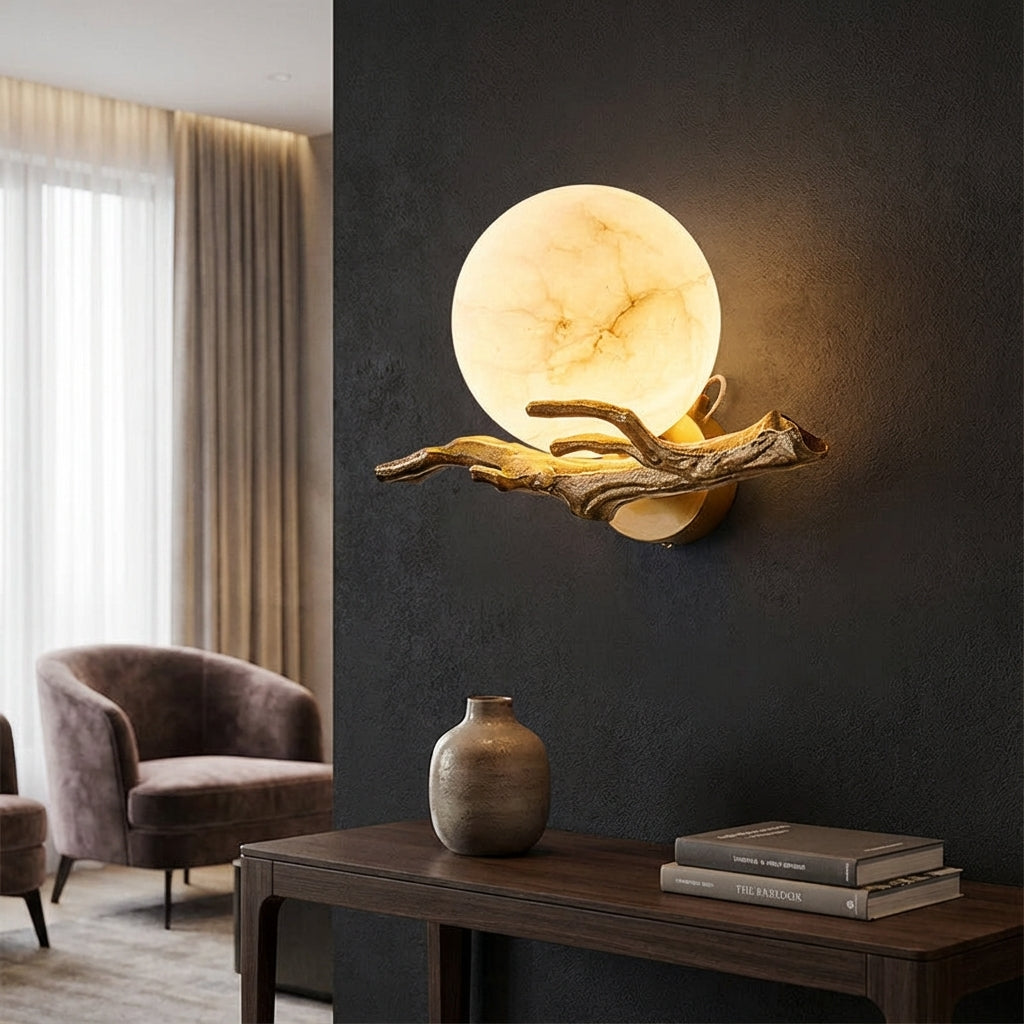 Modern sculptural marble & copper LED wall light, perfect for contemporary living room or bedroom decor.
