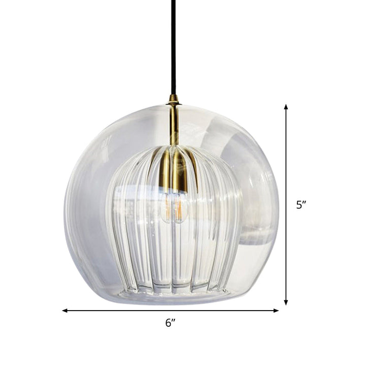 Elegant modern sphere pendant light. A minimalist hanging fixture perfect for stylish kitchen & dining decor.
