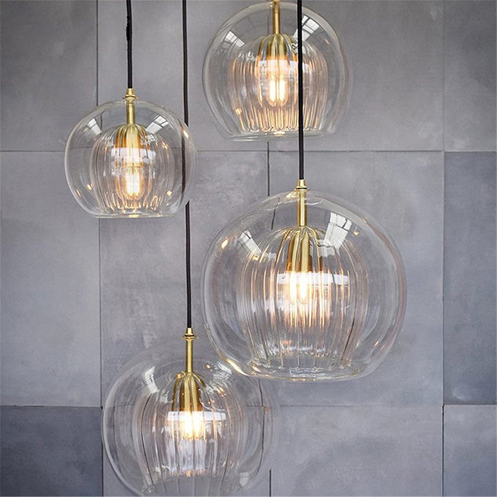 Contemporary glass pendant light, globe ceiling lamp offering bright, stylish home lighting.