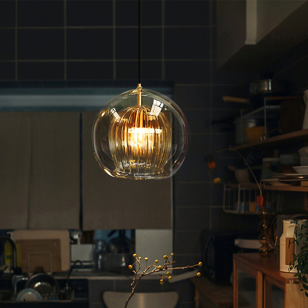 Modern elegant spherical light, clear glass pendant for sophisticated home decor solutions.