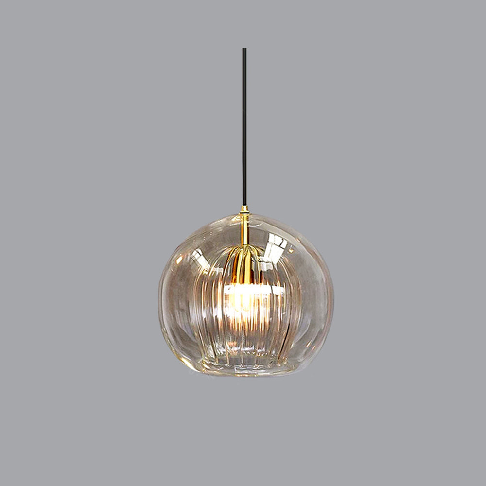 Stylish modern spherical pendant light for elegant home decor, perfect above a kitchen island.