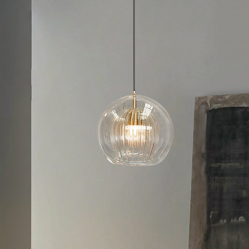 Spherical glass pendant light, minimalist design for elegant modern lighting in homes.