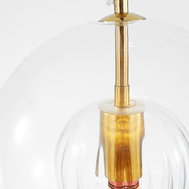 Elegant spherical light fixture, clear glass pendant perfect for bedrooms & living rooms.