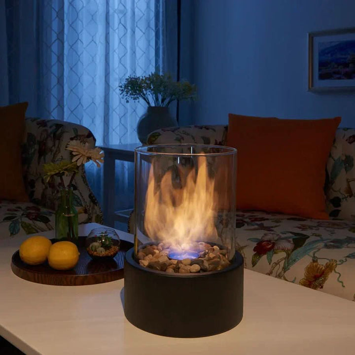 Portable bioethanol fire pit on a patio table, perfect for indoor/outdoor smokeless decor.