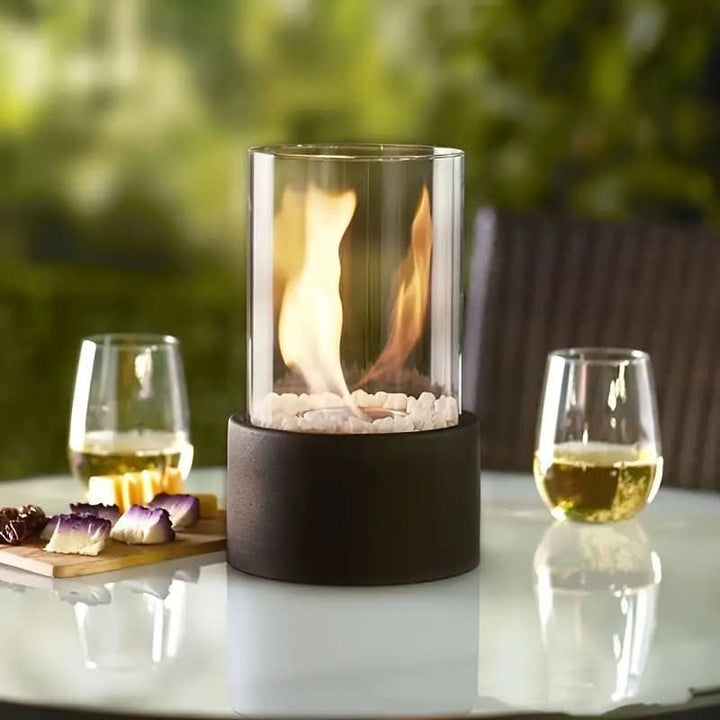 Versatile indoor/outdoor bioethanol fire pit. Smokeless, real flame for modern table decor & patio.