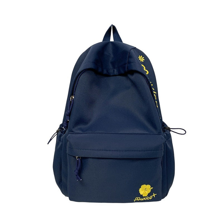 Contemporary minimalist unisex everyday backpack in durable fabric. Perfect for school, travel, work, and casual use.