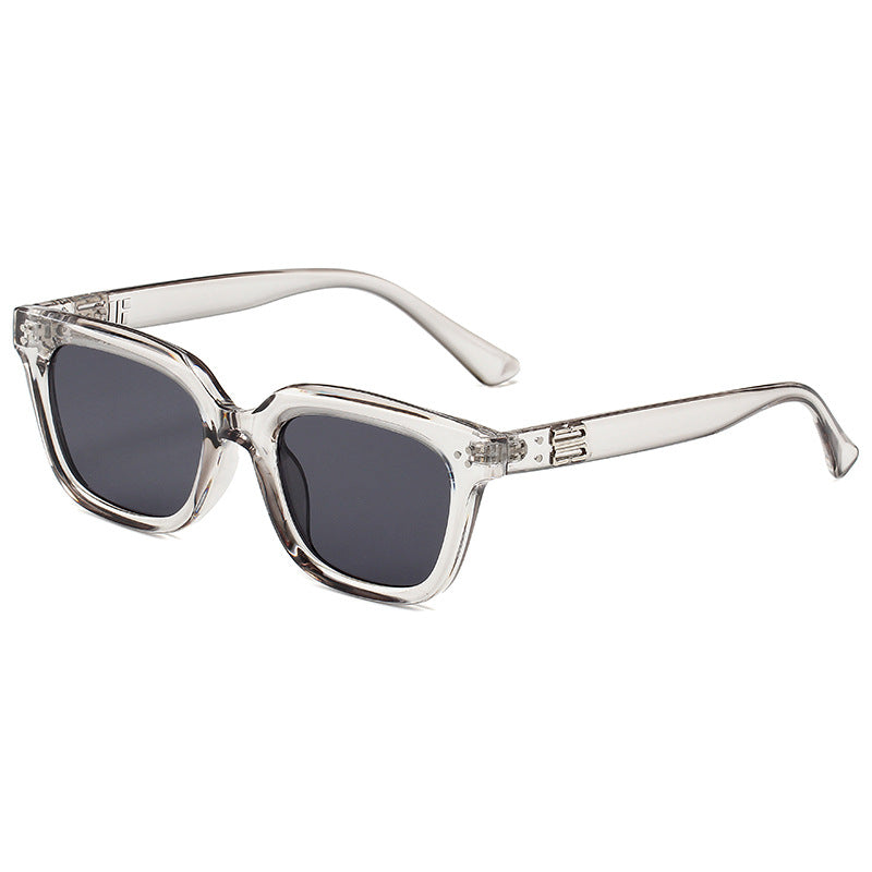 Lightweight fashion eyewear, black framed unisex sunglasses for modern casual style.