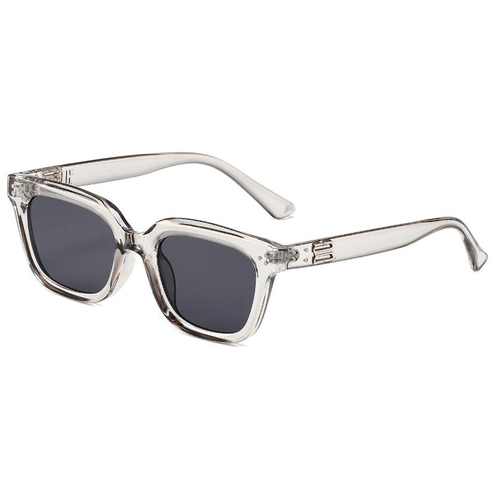 Lightweight fashion eyewear, black framed unisex sunglasses for modern casual style.