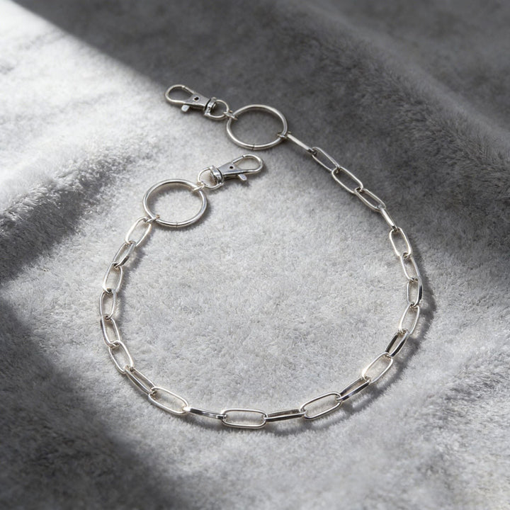 Stylish unisex stainless steel chain in various link styles. Modern fashion and streetwear jewelry accessory.
