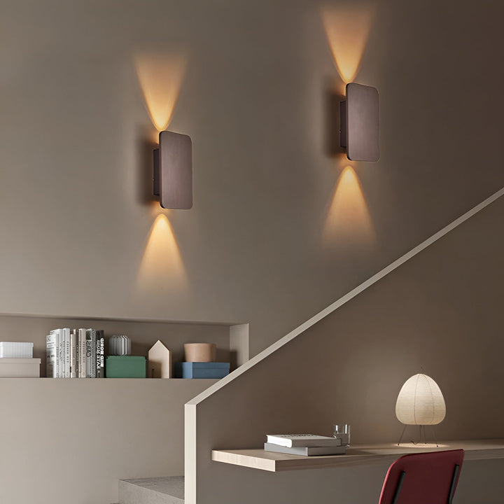 Energy-efficient LED wall lamp providing warm up-down ambient lighting for any indoor space.