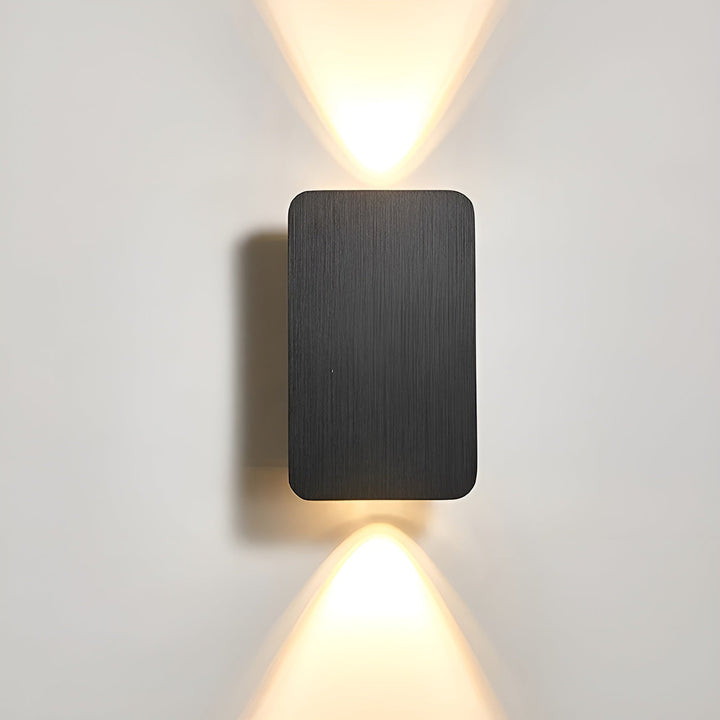 Minimalist LED up-down wall light fixture, offering energy-efficient and contemporary ambient lighting.