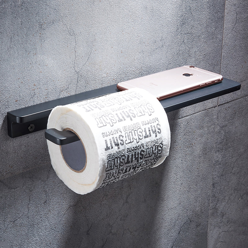Minimalist wall-mount toilet paper dispenser and phone shelf, modern black finish for bathroom decor.