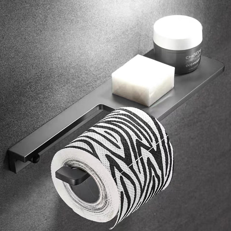 Efficient wall-mounted toilet paper holder with phone storage. Gun grey, minimalist bathroom organizer.