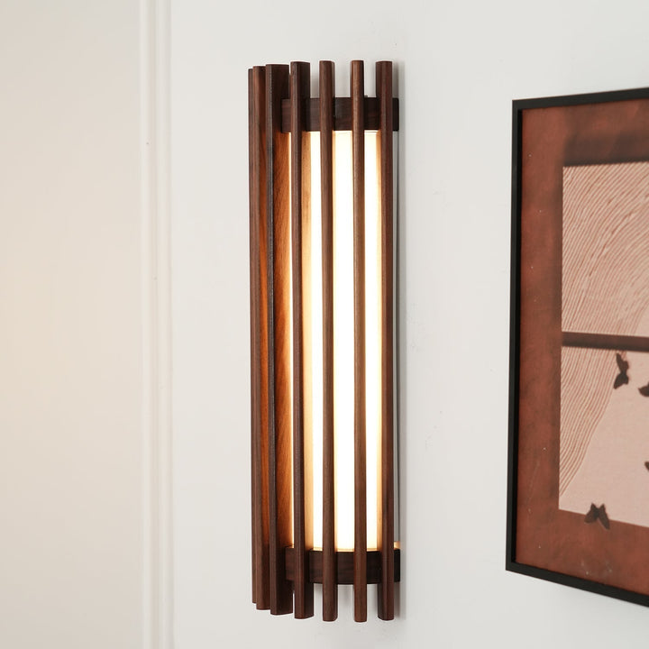 Contemporary wood wall light, sleek design, ideal modern home decor piece.