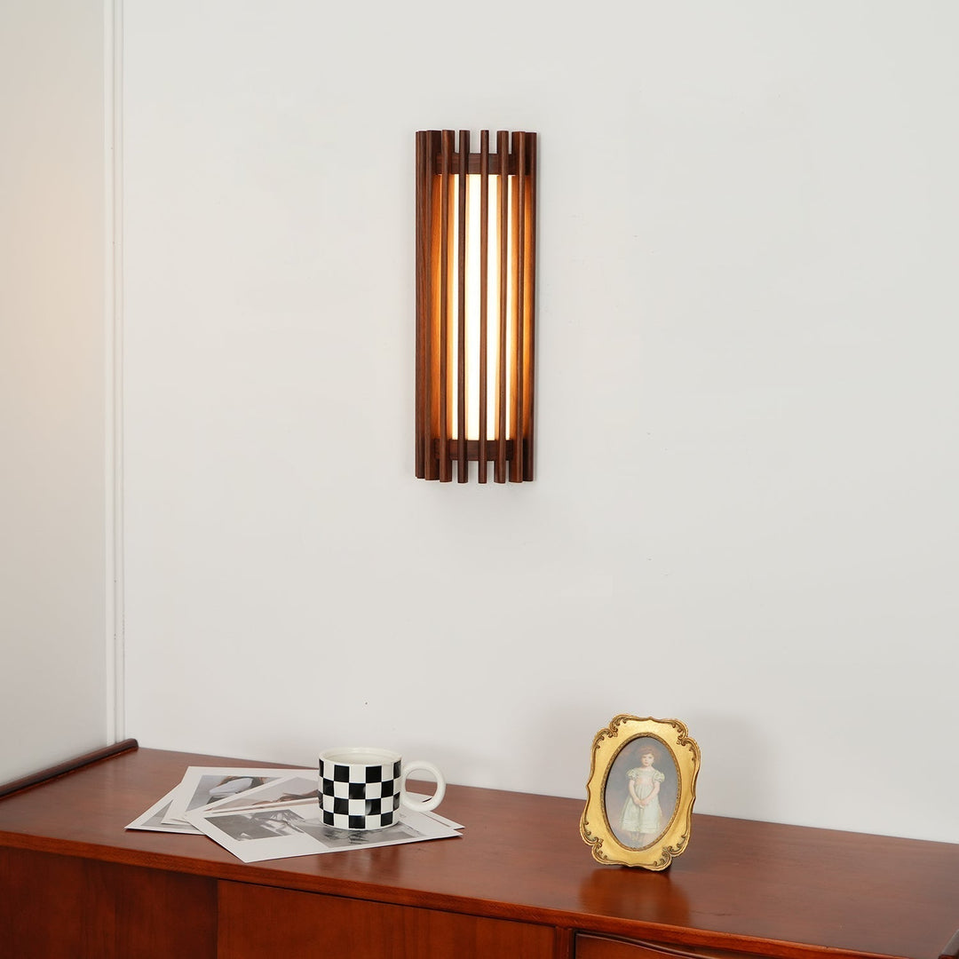 Contemporary wood wall lamp, elegant design for indoor ambient lighting.