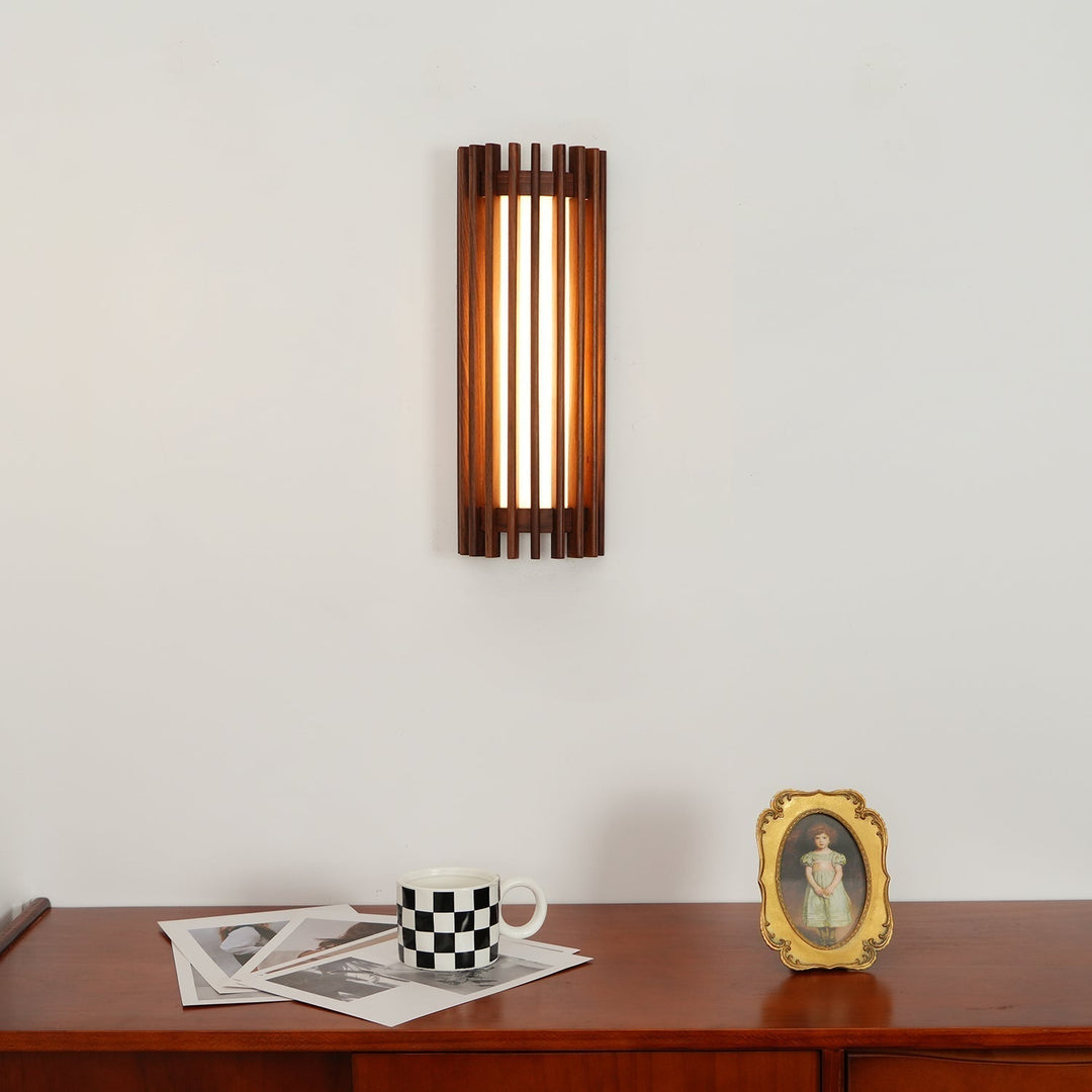 Sleek indoor wall light, modern wood fixture with warm ambient LED glow.