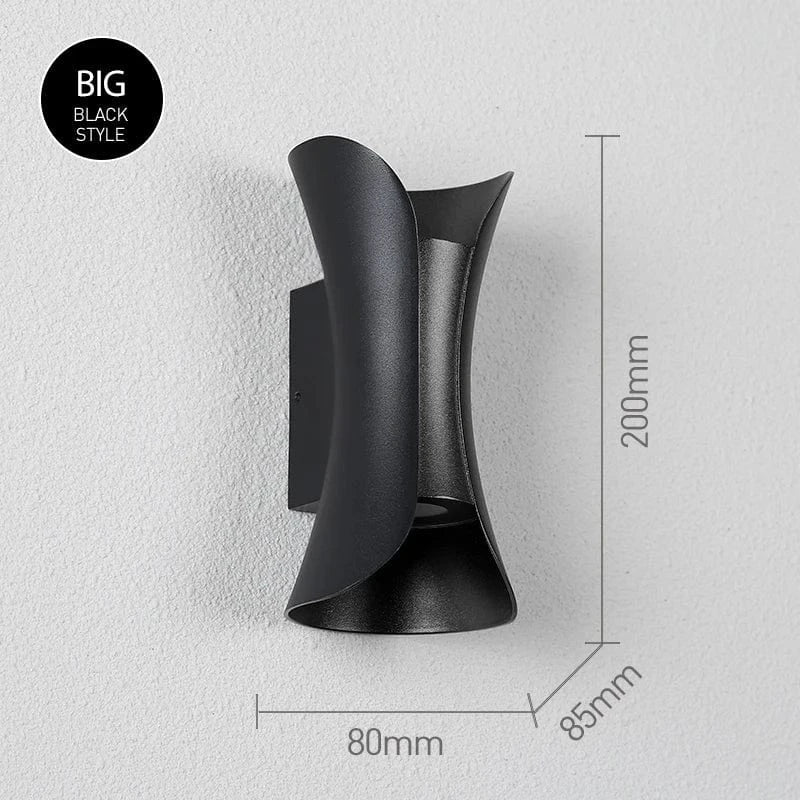 Contemporary indoor/outdoor LED wall light, offering bright and energy-efficient illumination.
