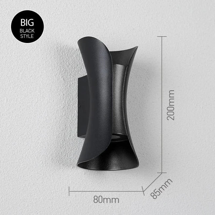 Contemporary indoor/outdoor LED wall light, offering bright and energy-efficient illumination.