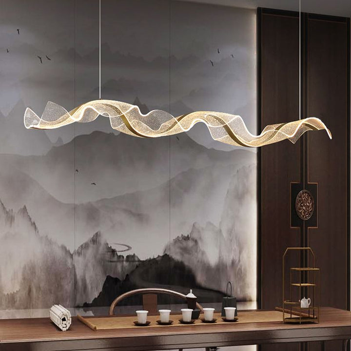 Chic Modern Wave LED pendant light for contemporary homes, enhancing any interior space.