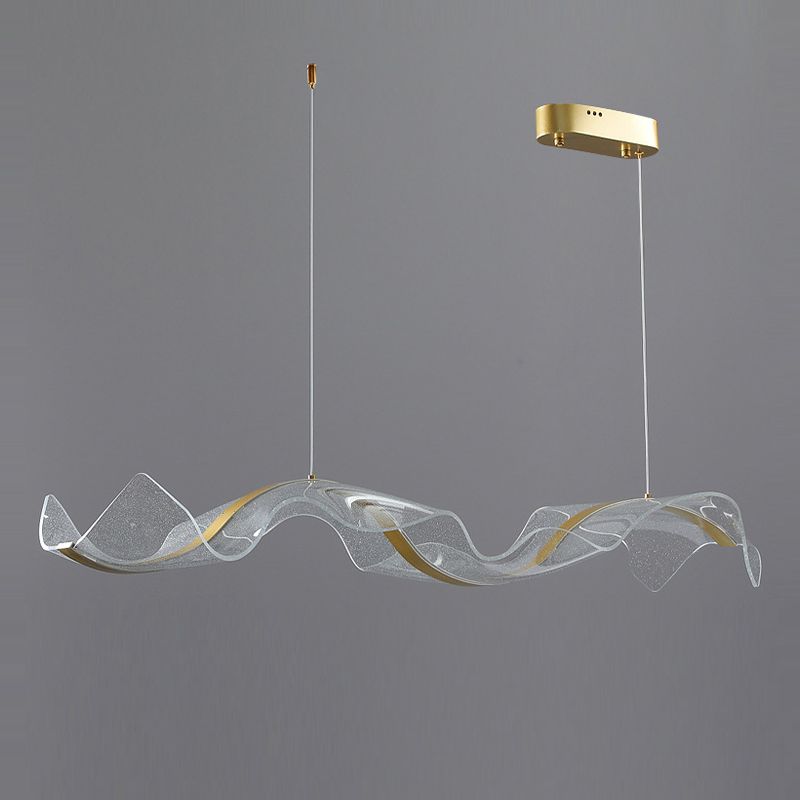 Unique Wave LED light fixture with a modern gold accent, a statement piece for contemporary decor.
