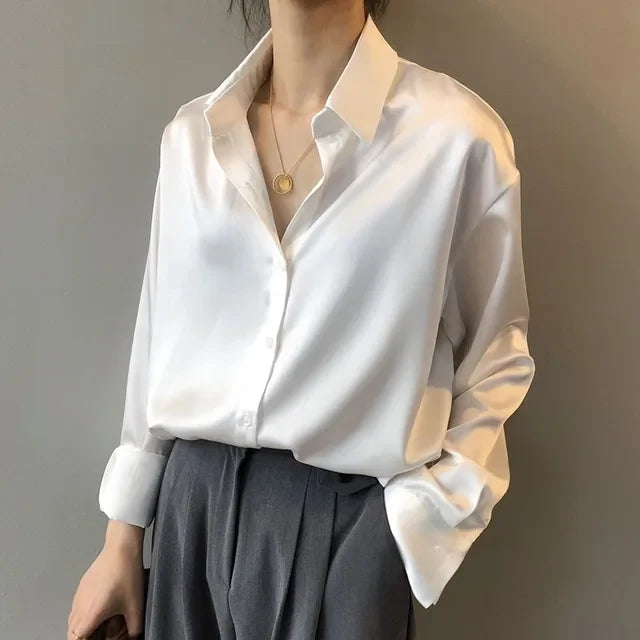 Sophisticated women's long sleeve button down blouse. Comfort fit, ideal elegant shirt for work or modern chic style.