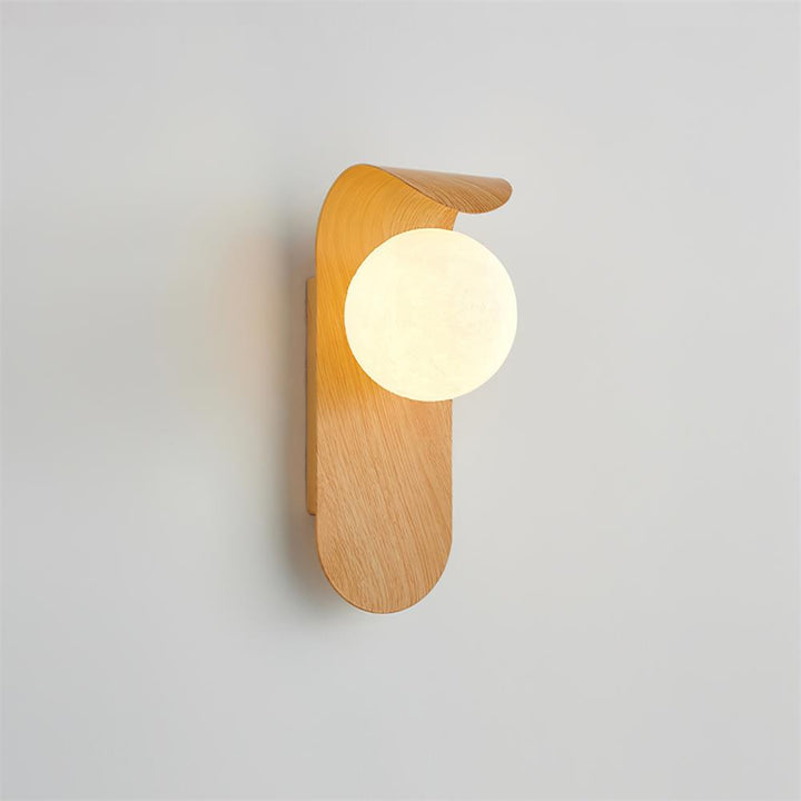 Spherical opal glass globe LED wall light, wood effect mount, for ambient lighting.