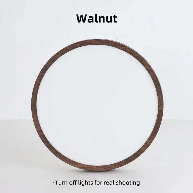 Circular wooden LED light, ultrathin profile, offering modern, energy-efficient glow.