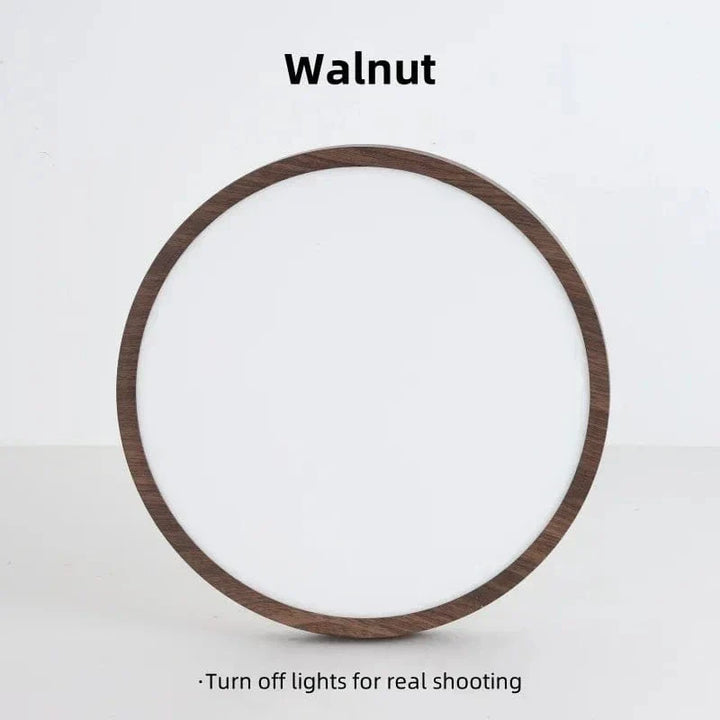 Circular wooden LED light, ultrathin profile, offering modern, energy-efficient glow.