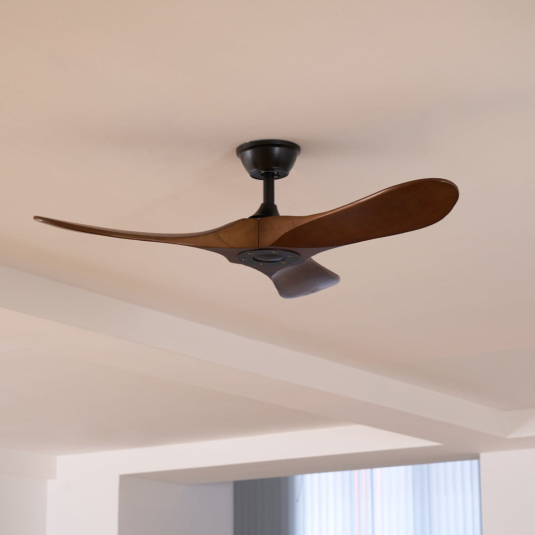 Full view of a modern wooden ceiling fan, remote control, enhancing any room.