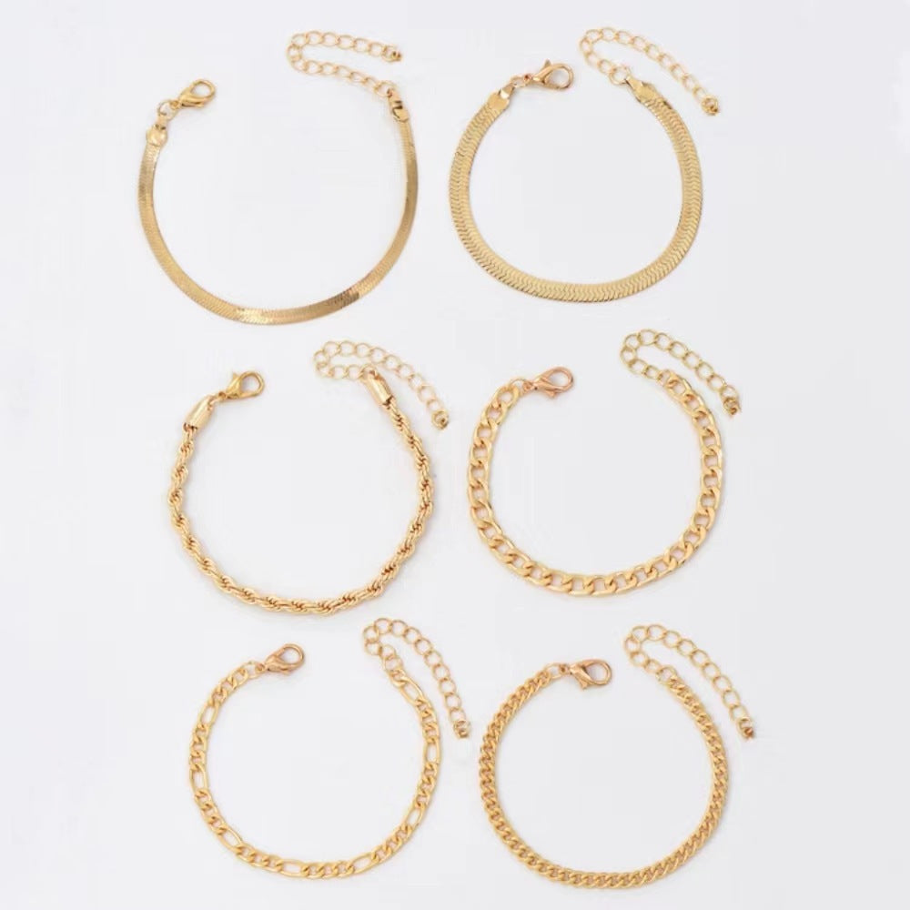 Elegant women's gold chain bracelet set. Stackable and versatile, a perfect fashion accessory gift for her.
