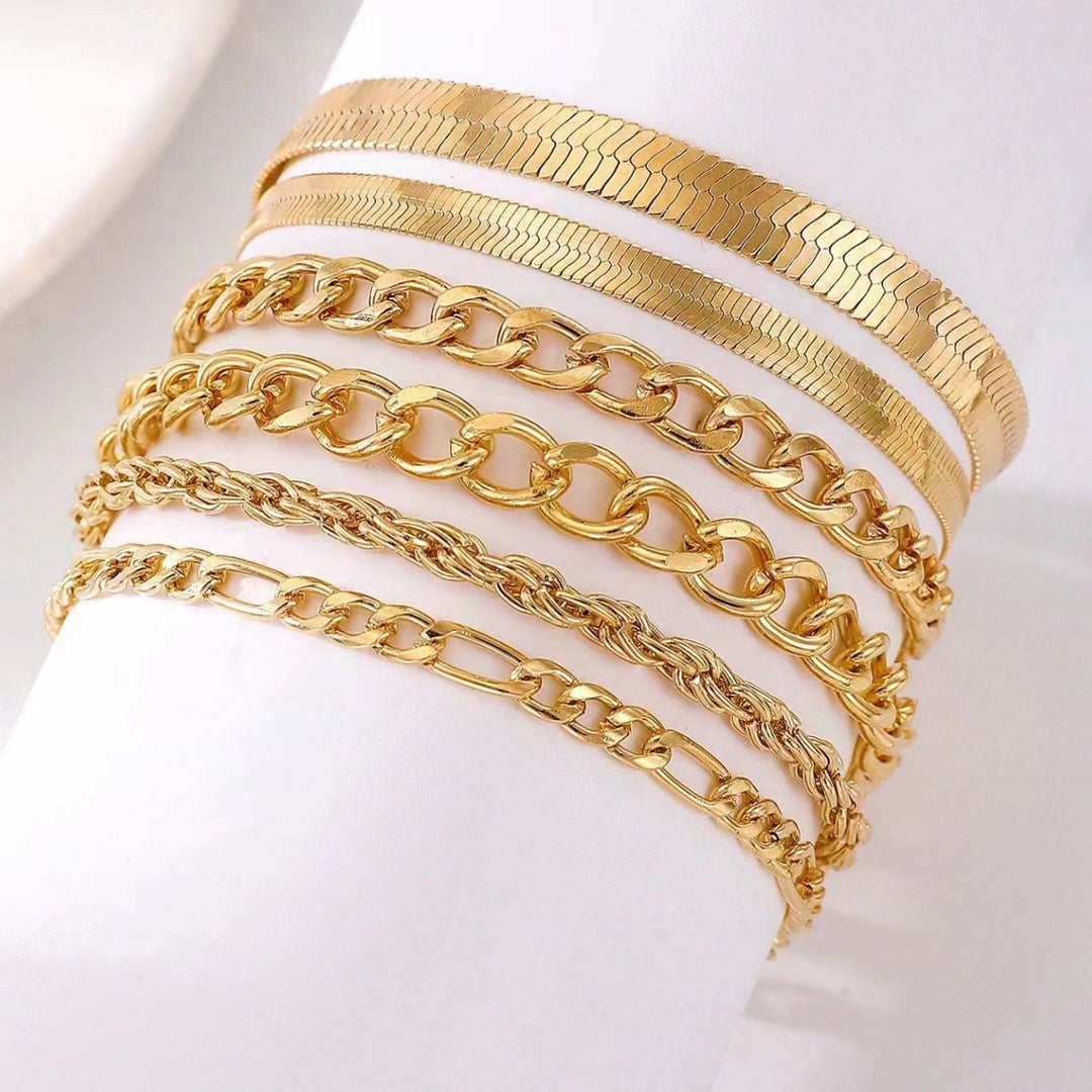 Stackable gold chain bracelet set for women. A versatile fashion accessory and ideal gift for her.