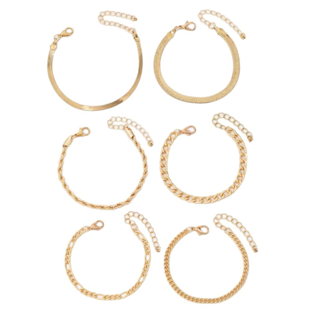 Modern minimalist gold chain bracelet set for women. Versatile, stackable, and stylish women's jewelry.