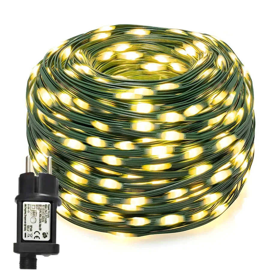 Warm white LED rope lights providing soft, decorative illumination for garden pathways & patio ambiance.