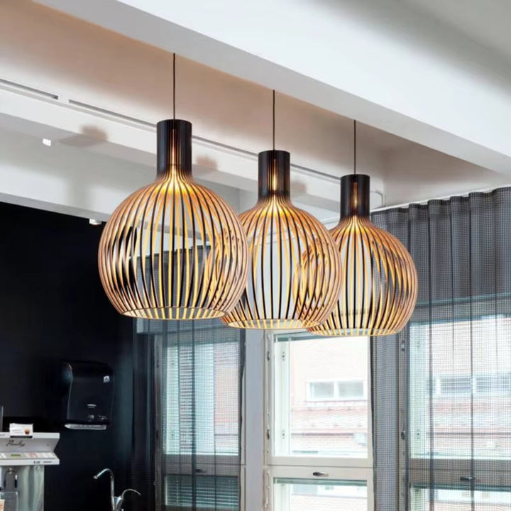Natura Orb organic wooden pendant lamp, modern design for cozy living rooms & dining areas. Natural interior lighting.