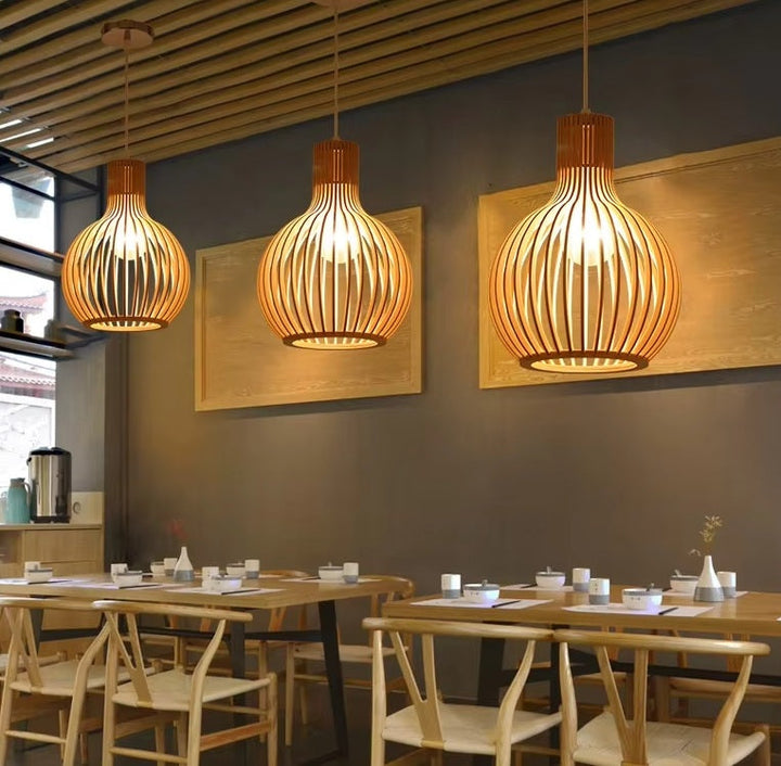 Elegant Natura Orb wooden ceiling lamp, an organic pendant light fixture for modern and natural home decor.