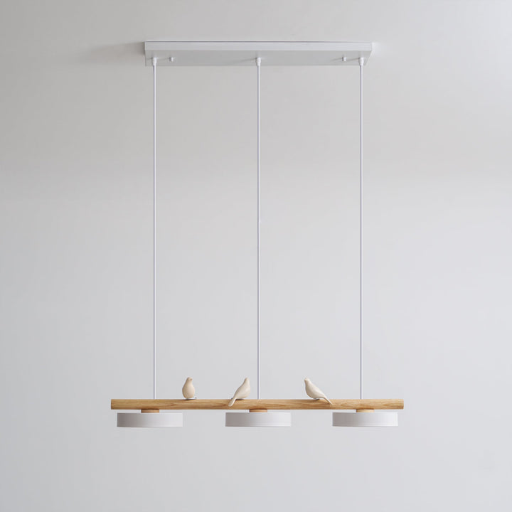 Elegant nature-inspired bird pendant, adjustable LED light for sophisticated ambiance.