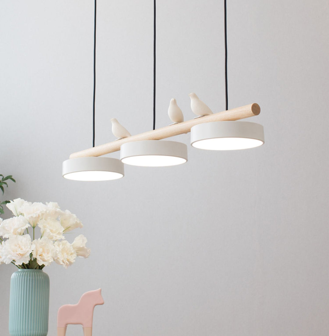 Elegant bird pendant light, nature-inspired design with adjustable LED for ambient lighting.